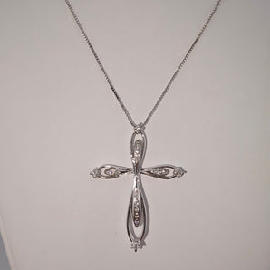 Collier croix diamants or blanc