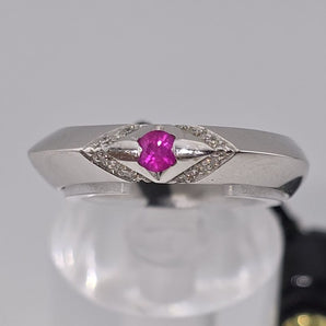 Anello rubino e diamanti oro bianco