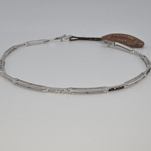 Bracciale tennis uomo diamanti bianchi e neri oro bianco