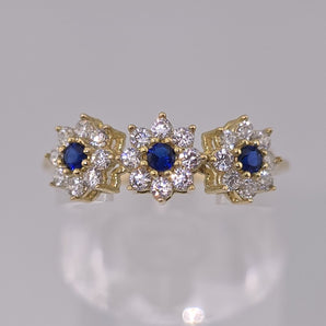 Anello trilogy fiori blu oro giallo