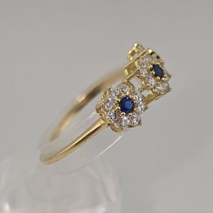 Anello trilogy fiori blu oro giallo