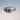 Anello trilogy blu oro bianco - Gioielleria Angela 
